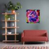 Chromatic Paradox abstract painting by Yelena Revis on a charcoal wall above a terracotta sofa