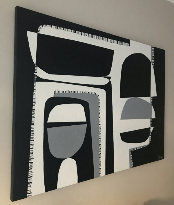 Angled side view of Contrasts II showing the black canvas edge and bold geometric shapes
