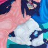 Detail of textured white and soft pink sculptural ribbons in Dance of Blues by Yelena Revis