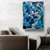 In-Situ Living Room Display — "Deep Sea Extravaganza" Abstract Painting by Yelena Revis Deep Sea Extravaganza abstract painting by Yelena Revis on a white brick wall above a modern sofa