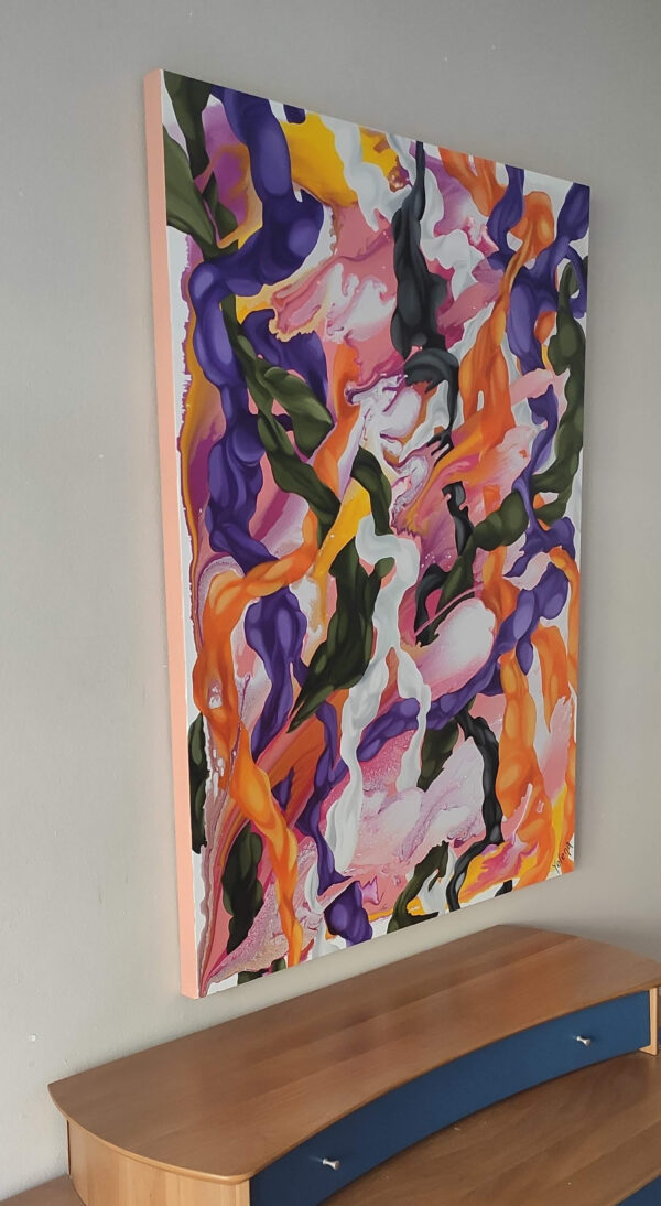 Side view of Euphoric Whirlwind by Yelena Revis above a wooden console table
