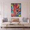 Garden of Eden I painting by Yelena Revis styled above a cream sofa in an elegant, bright living room interior.