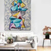 Philosophy of Architecture geometric abstract painting by Yelena Revis above a white sofa in a bright living room