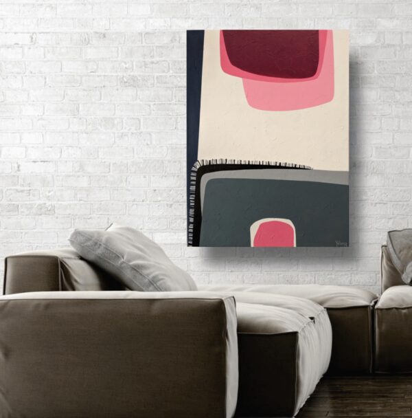 Pink Reflection abstract painting by Yelena Revis on a white brick wall above a leather sectional sofa