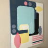 Side view of Summer Breeze by Yelena Revis above a wooden sideboard