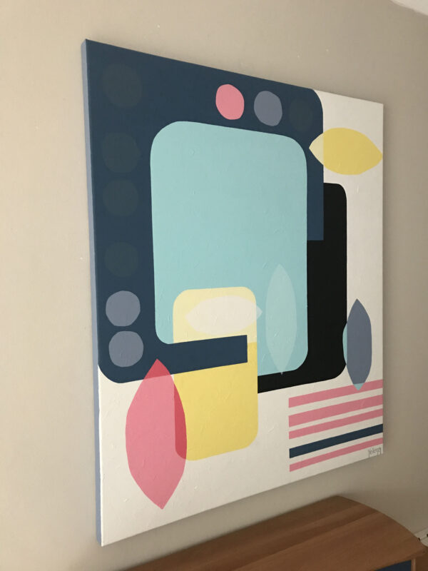 Side view of Summer Breeze by Yelena Revis above a wooden sideboard