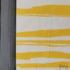 Yelena Revis dark grey signature over yellow and off-white stripes in Sunny Colour Mood