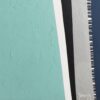 Yelena Revis signature in the bottom right of White Night, over turquoise and grey impasto